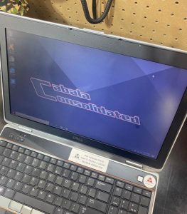 Laptop with Cadala Consolidated logo