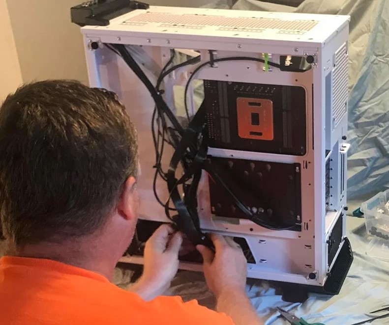 Technician assembling computer