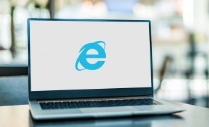 Laptop computer displaying logo of Internet Explorer