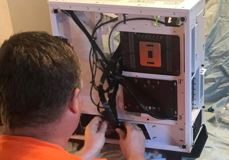 Technician assembling computer